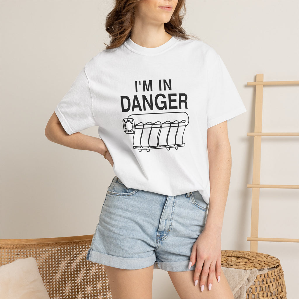 White T-shirt with 'I'm in Danger' logo graphic, worn with light denim shorts