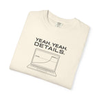 Ivory crew-neck T-shirt with "YEAH. YEAH. DETAILS." laptop graphic