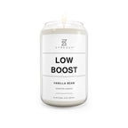 Soy candle in clear jar with flame, Low Boost Vanilla Bean label