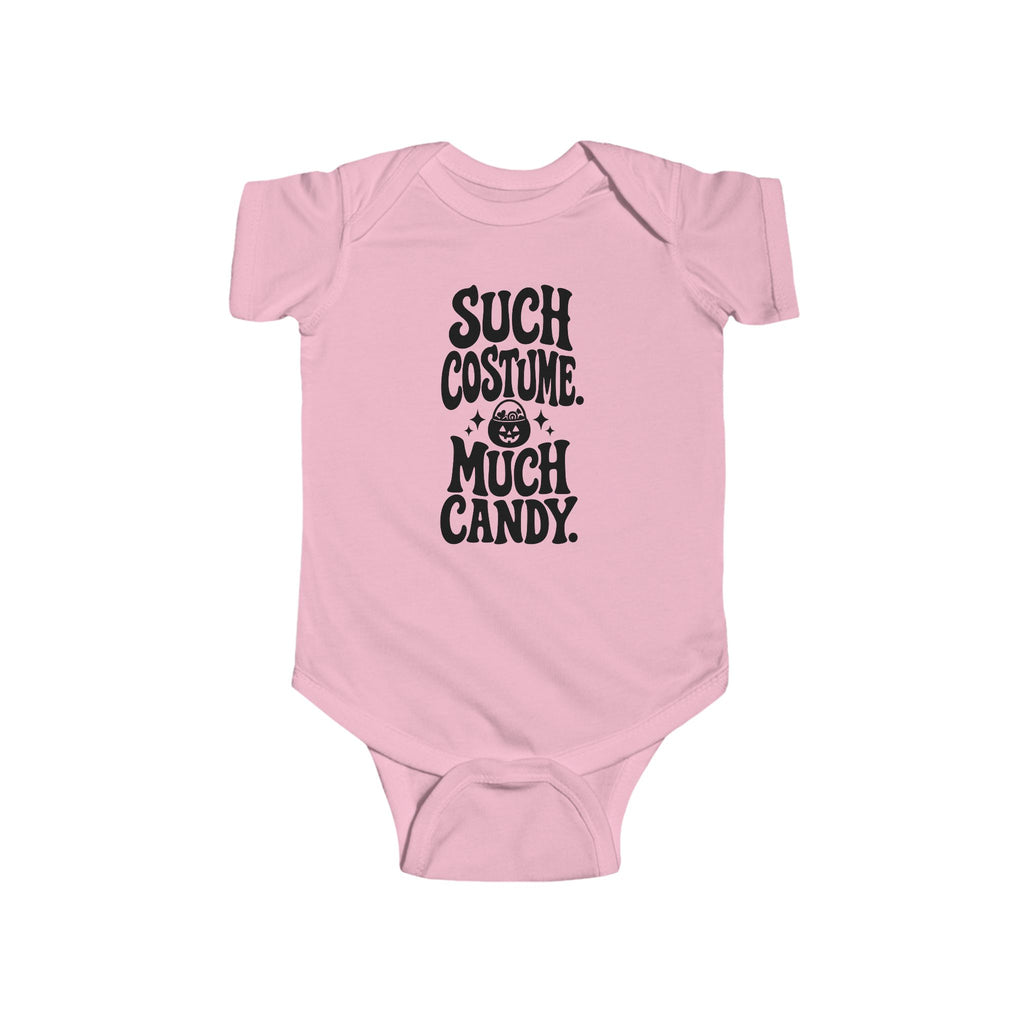 Pink baby bodysuit with black “SUCH COSTUME. MUCH CANDY.” graphic on front
