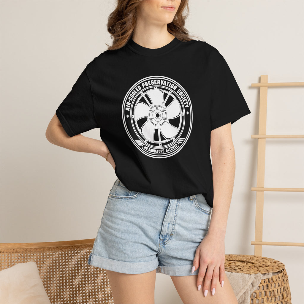 Black crew-neck T-shirt with circular wheel logo print, worn with denim shorts
