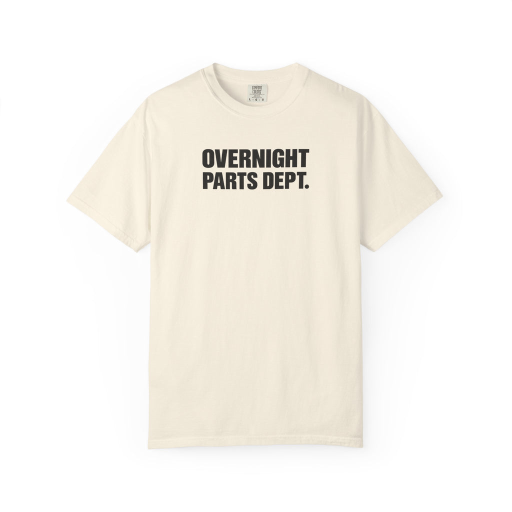 Ivory crew-neck T-shirt with bold "OVERNIGHT PARTS DEPT." logo on the front