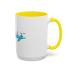 White mug with yellow rim and yellow handle, featuring teal logo print