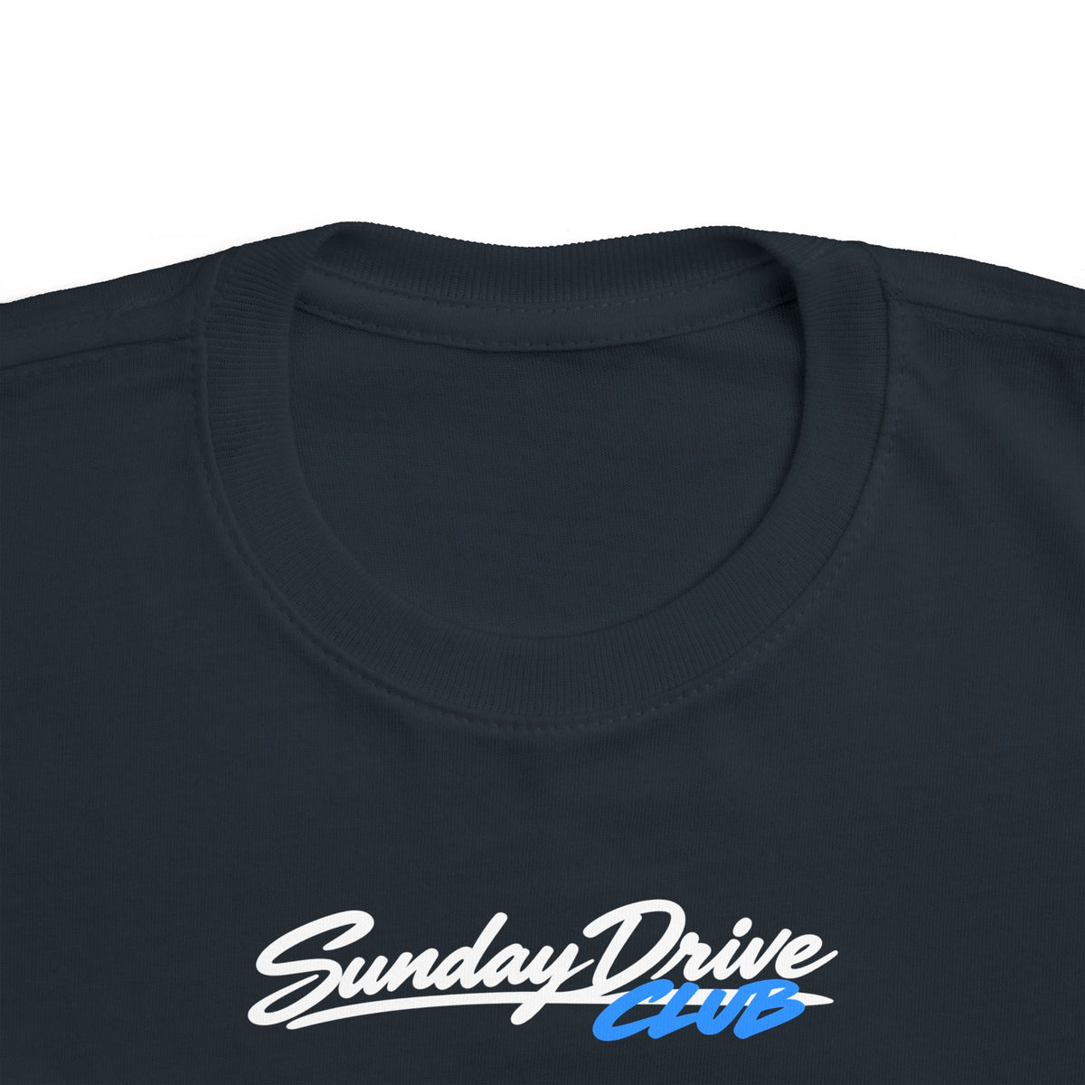 Black toddler T-shirt neckline with “Sunday Drive Club” logo close-up