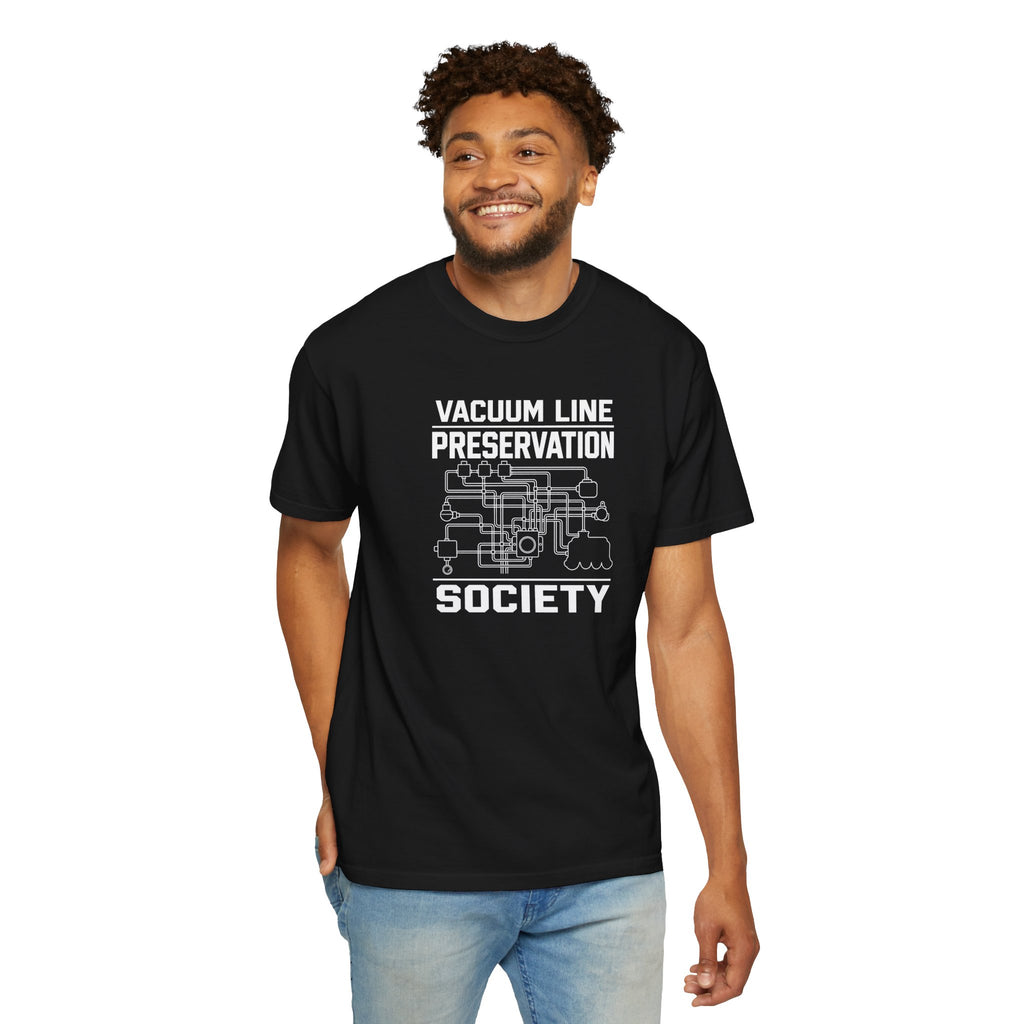 Black t-shirt with front Vacuum Line Preservation Society graphic on a man