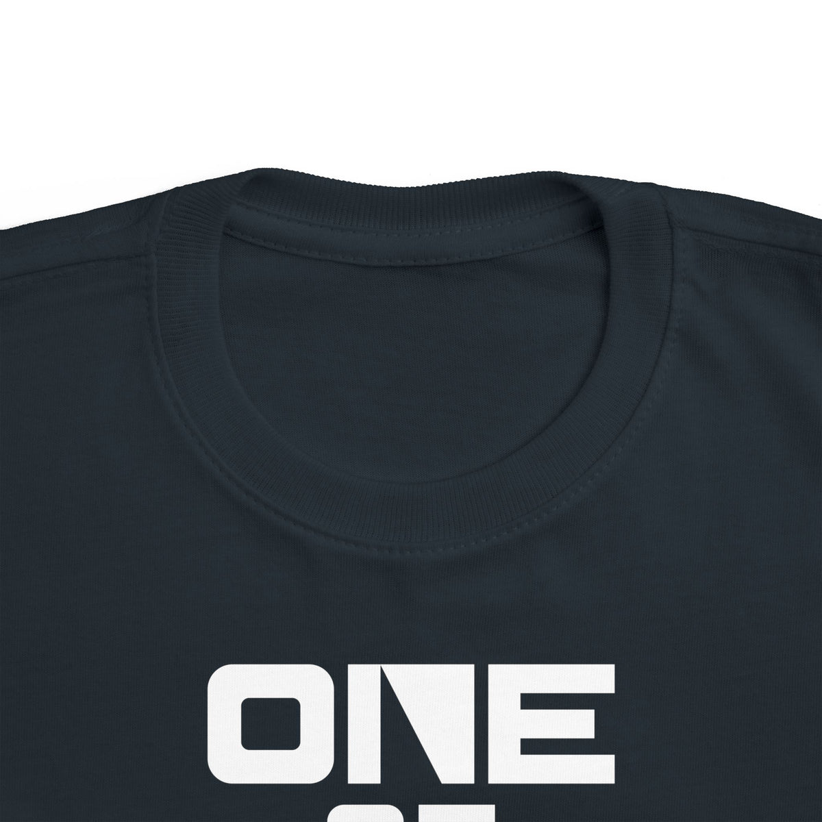Toddler black T-shirt close-up of “ONE” front graphic