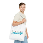 White Strezzy Racing tote bag worn on shoulder with front logo print