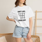 White T-shirt with front graphic, worn by model with blue denim shorts
