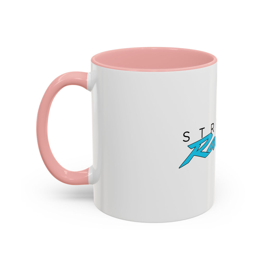 White mug with pink lid and pink handle; small “Racing” logo on the side