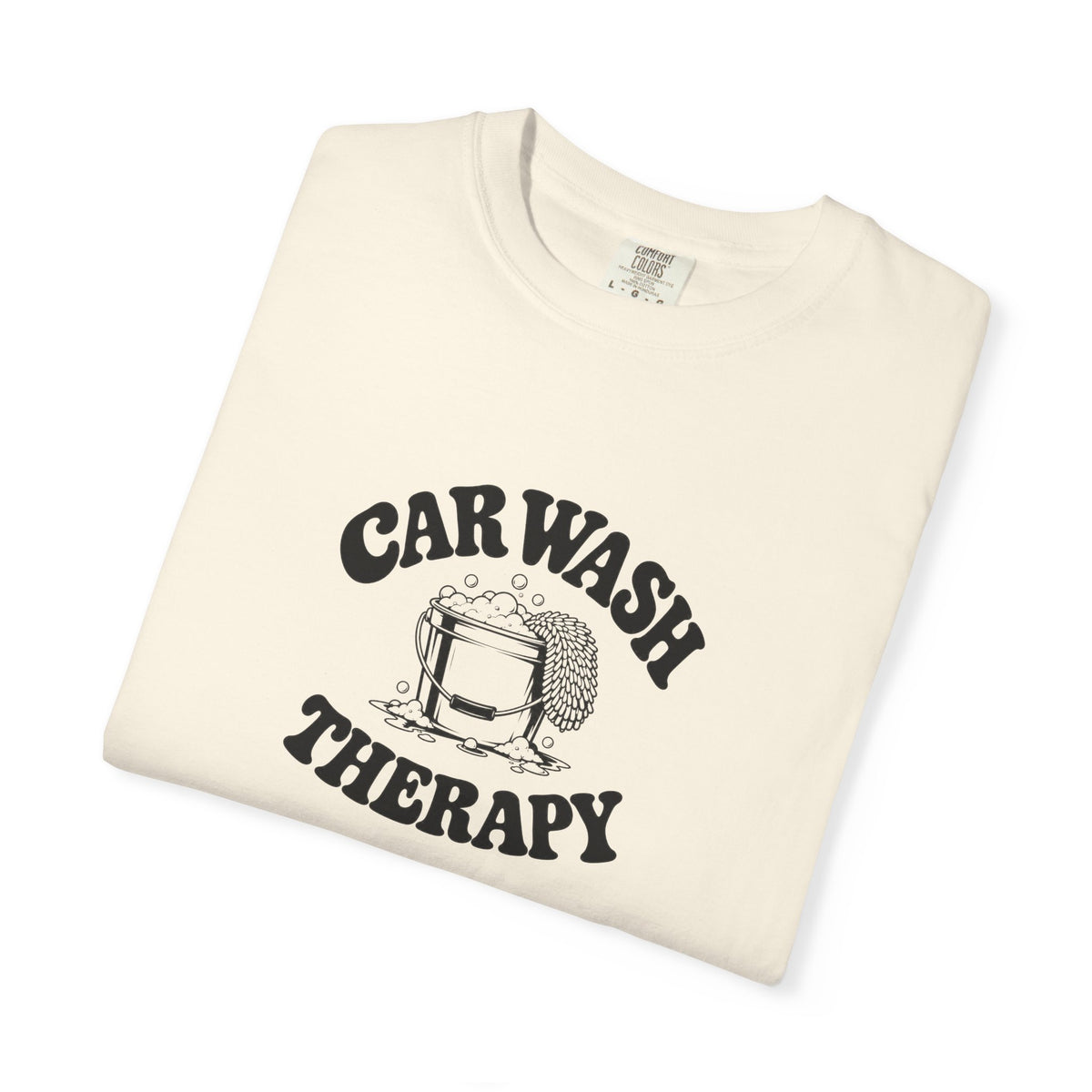 Ivory short-sleeve T-shirt with “CAR WASH THERAPY” graphic on front