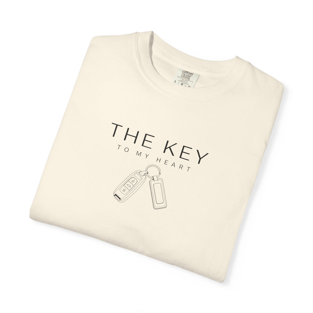 Ivory crew-neck T-shirt with car key graphic and THE KEY text