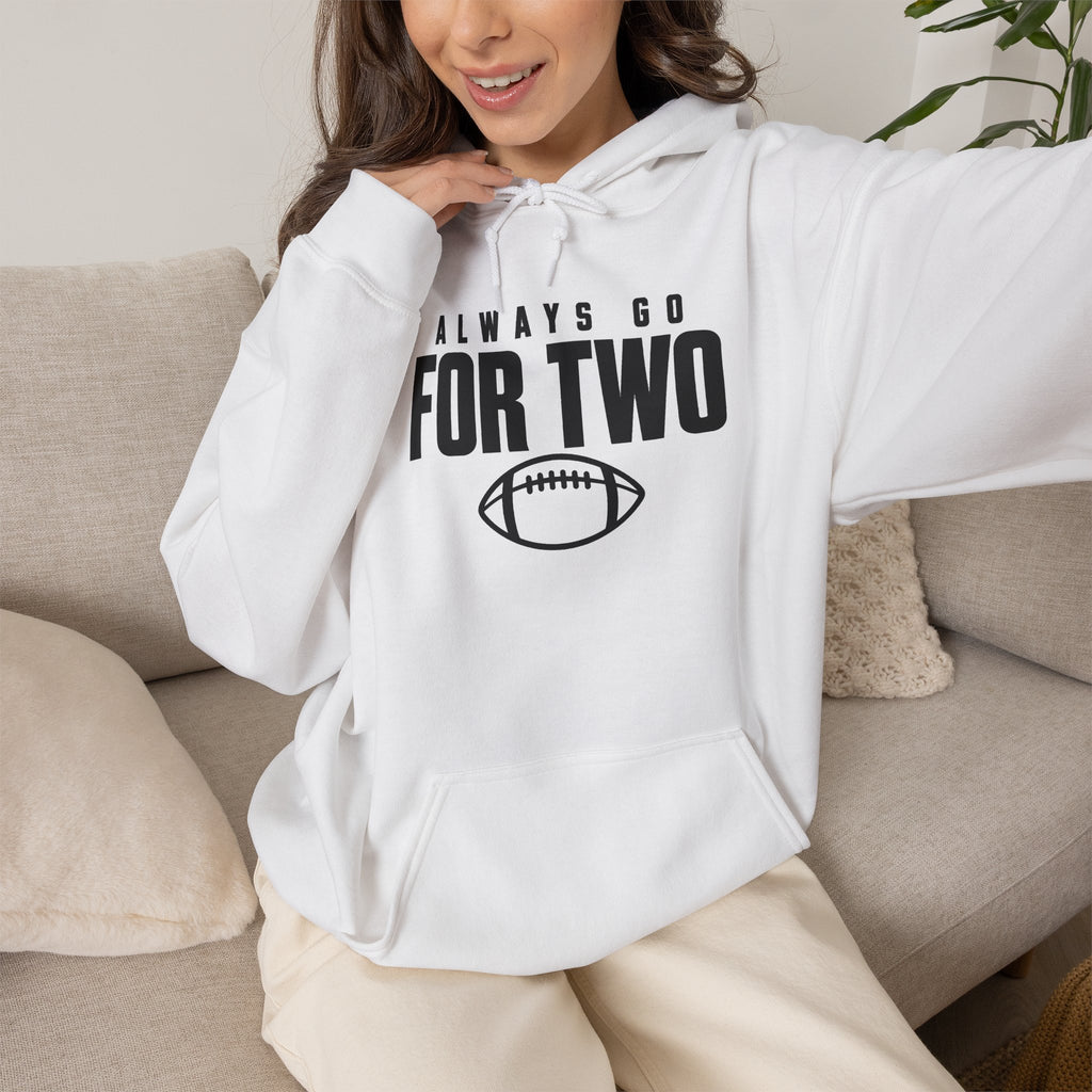 White football hoodie worn on model, showing front logo and drawstring hood
