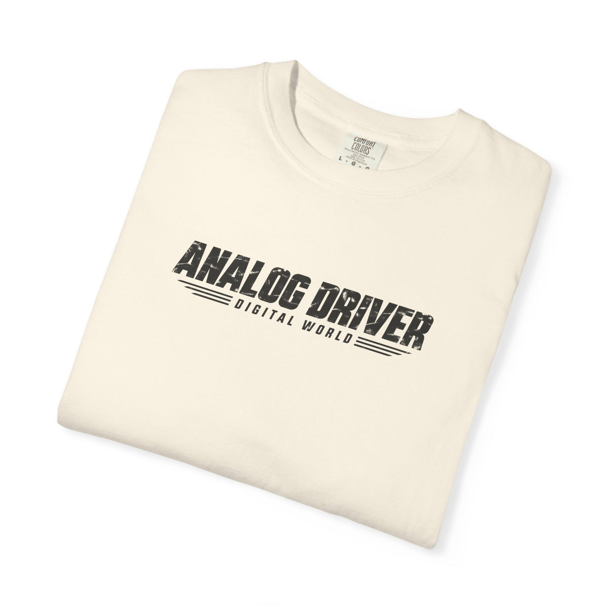 Ivory graphic T-shirt laid flat, showing “ANALOG DRIVER” chest logo