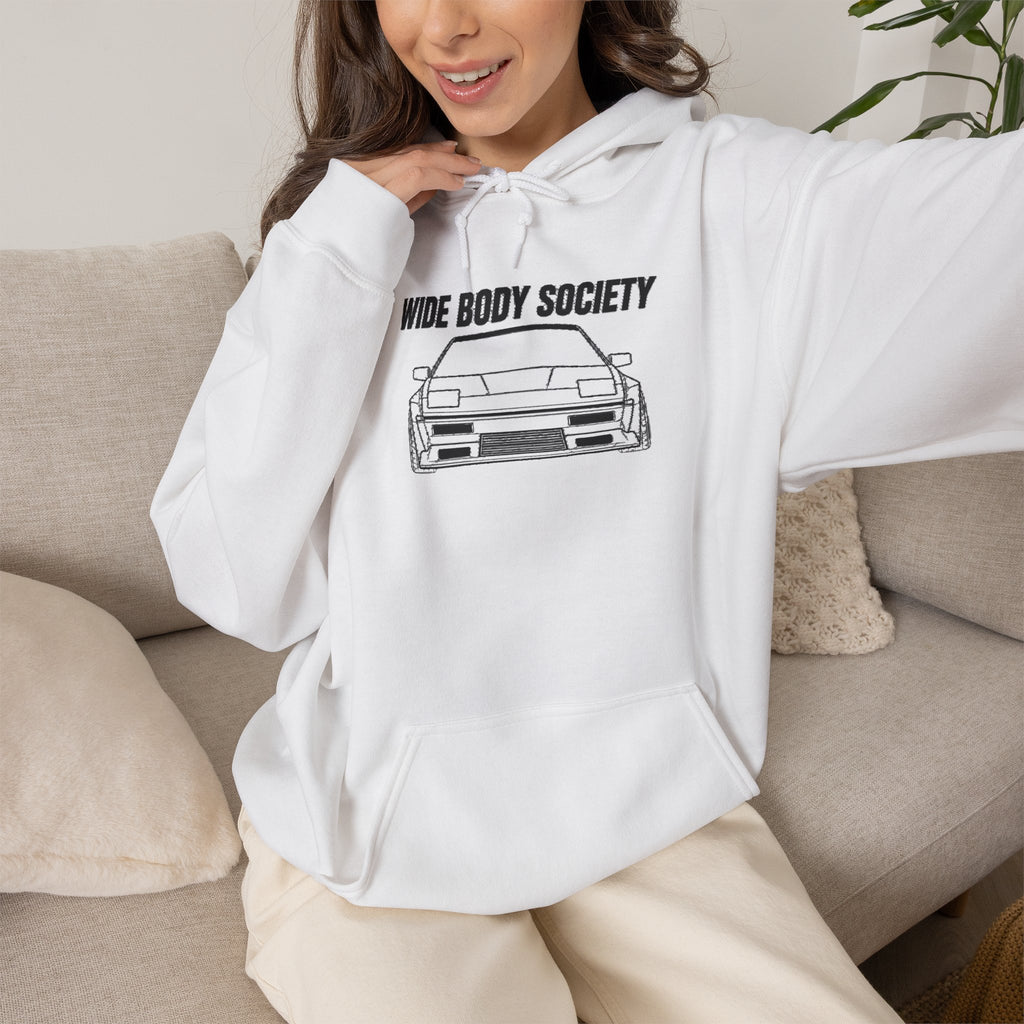 White JDM hoodie on person, front car graphic, drawstring hood, kangaroo pocket.