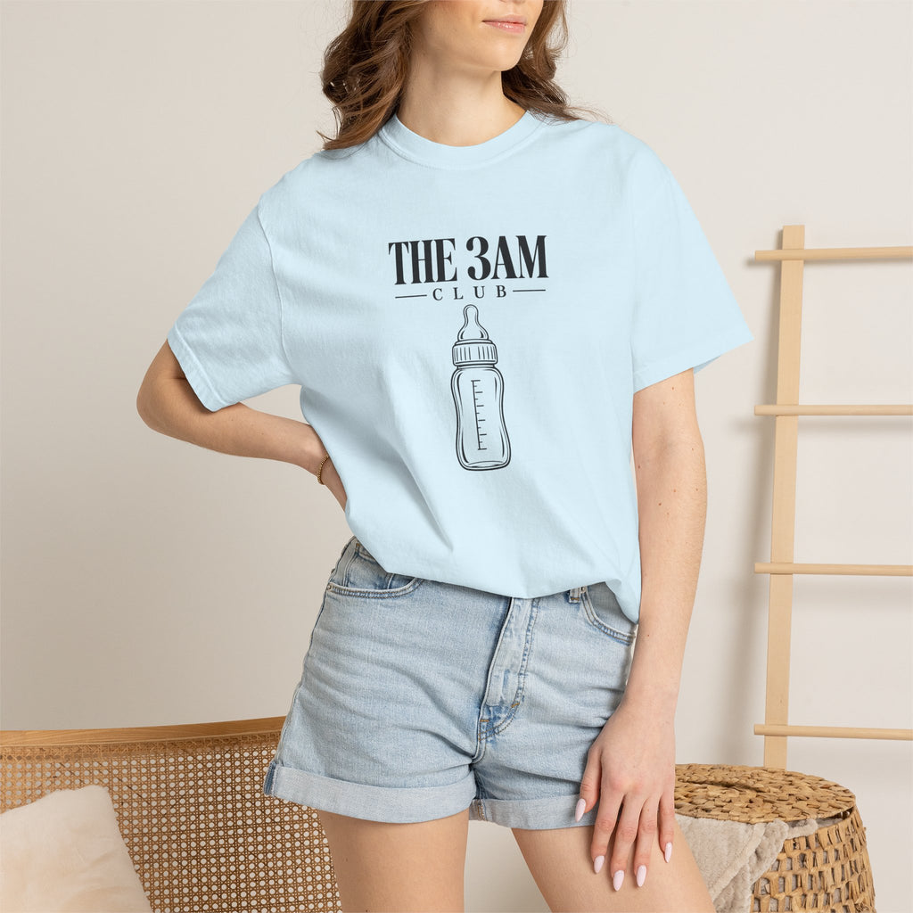 Light blue “THE 3AM CLUB” baby bottle graphic t-shirt worn by a model