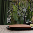 Silver keyring with black 'I ♥ TURBO NOISES' tag charm