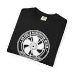 Black crew-neck T-shirt with large circular wheel logo print on the front