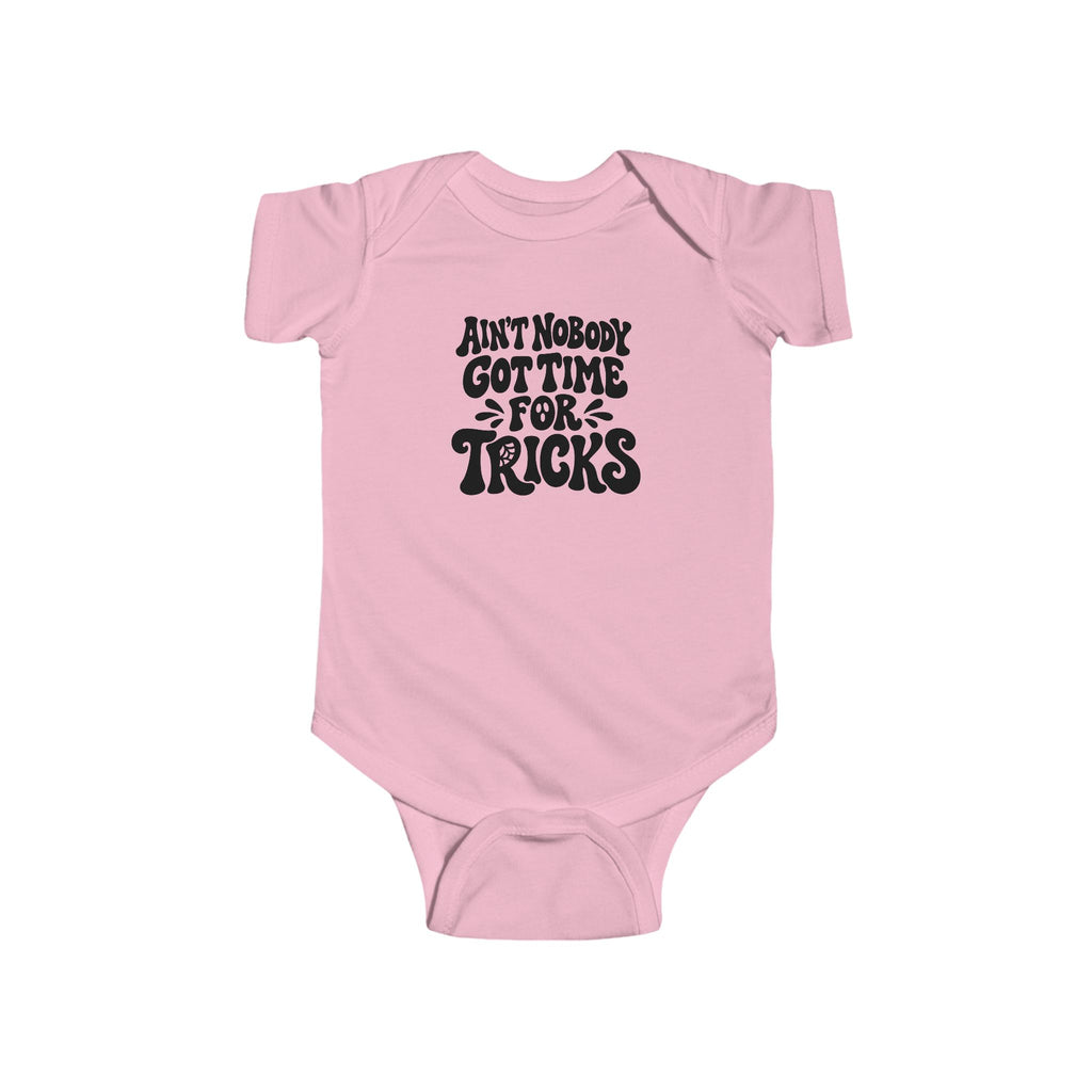 Pink baby bodysuit with “Ain’t nobody got time for tricks” Halloween text graphic