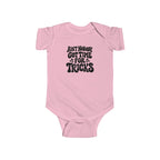 Pink baby bodysuit with “Ain’t nobody got time for tricks” Halloween text graphic
