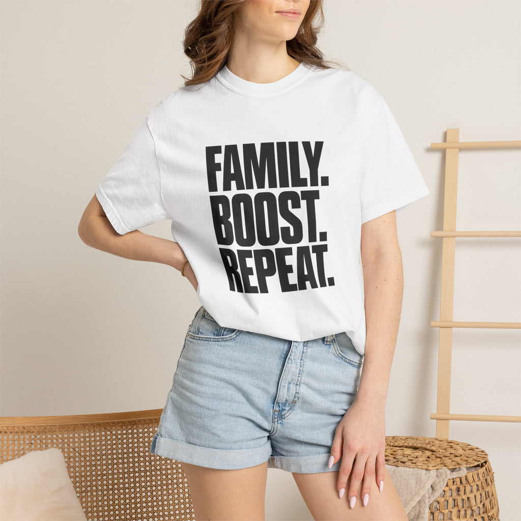 White crew-neck T-shirt with bold black "FAMILY BOOST REPEAT" graphic front