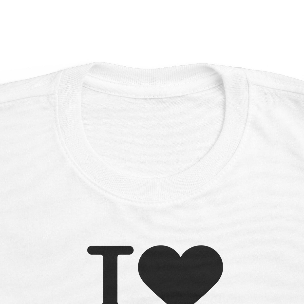 Toddler white t-shirt close-up of collar and 'I heart' graphic