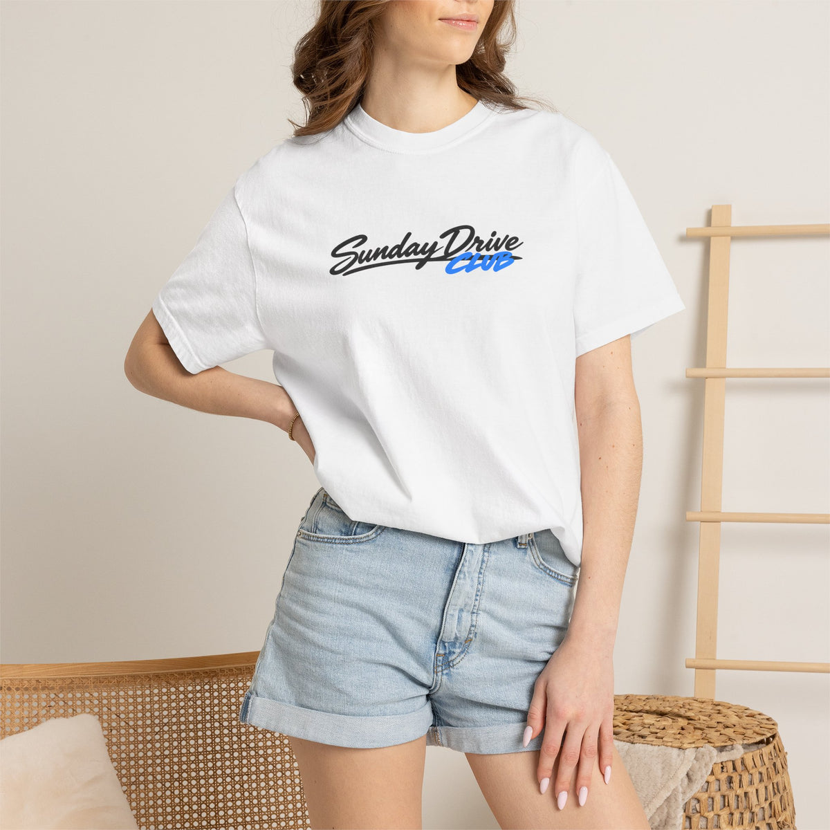 White T-shirt on model with “Sunday Drive Club” logo print