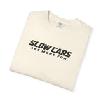 Ivory T-shirt folded with "SLOWCARS ARE MORE FUN" graphic across the front