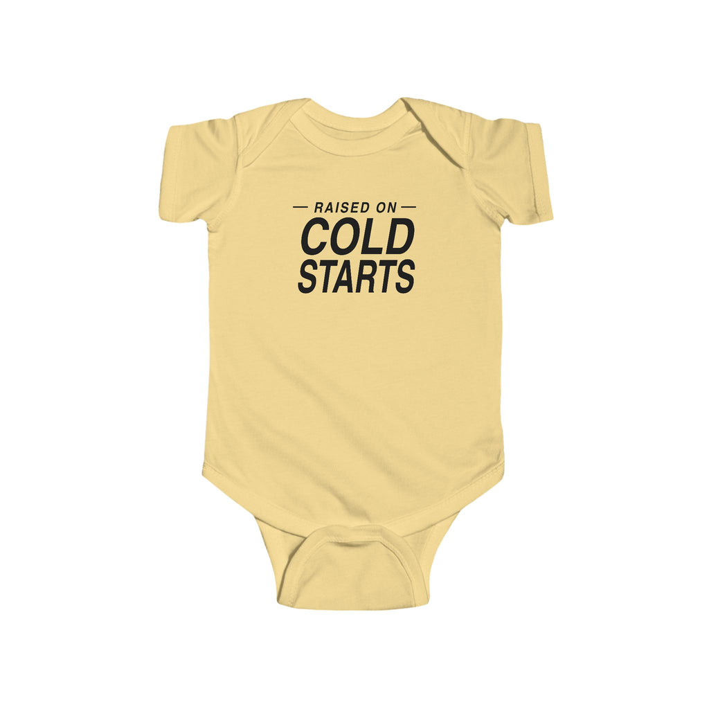 Butter yellow baby bodysuit with short sleeves and 'Cold Starts' front graphic