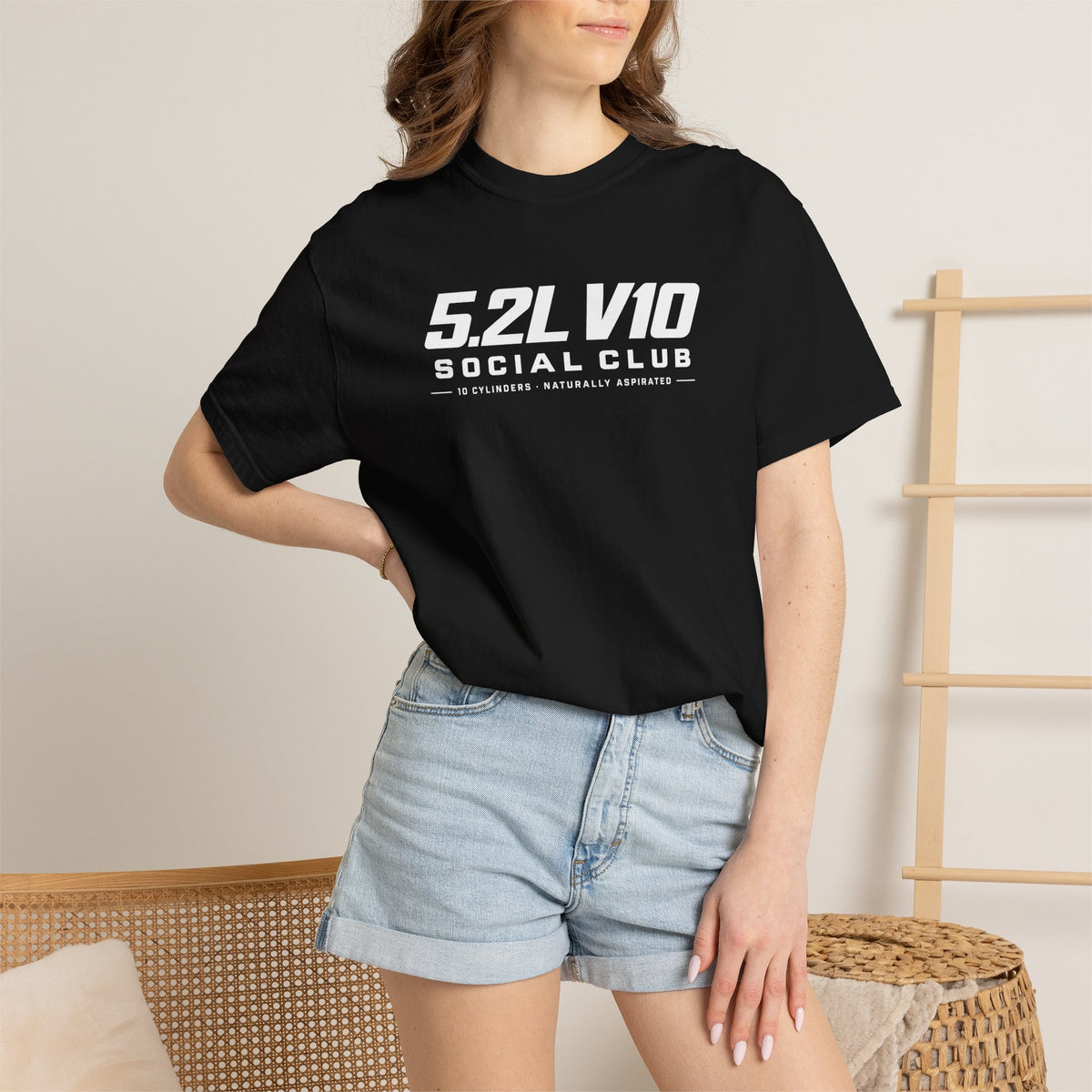 Black crewneck T-shirt with “5.2L V10 Social Club” front graphic worn by model