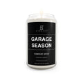 Garage Season comfort spice soy candle in clear glass jar with black label and flame