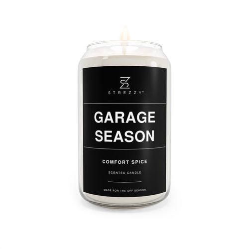 Garage Season comfort spice soy candle in clear glass jar with black label and flame