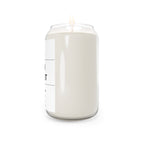 Soy candle in clear jar with flame, smooth off-white wax, side view