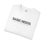 White crewneck T-shirt with 'BASIC NEEDS' front text, folded