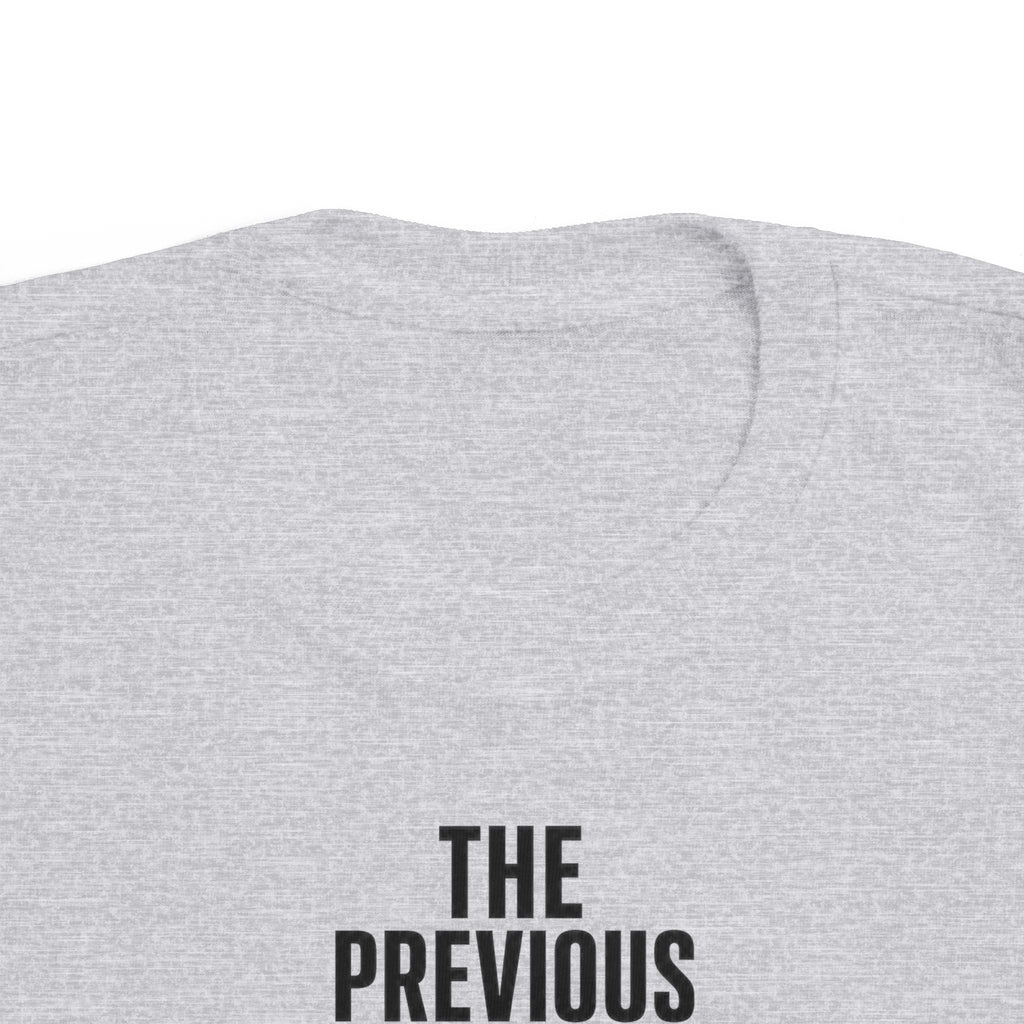 Heather gray toddler t-shirt close-up of back text starting with "THE PREVIOUS"