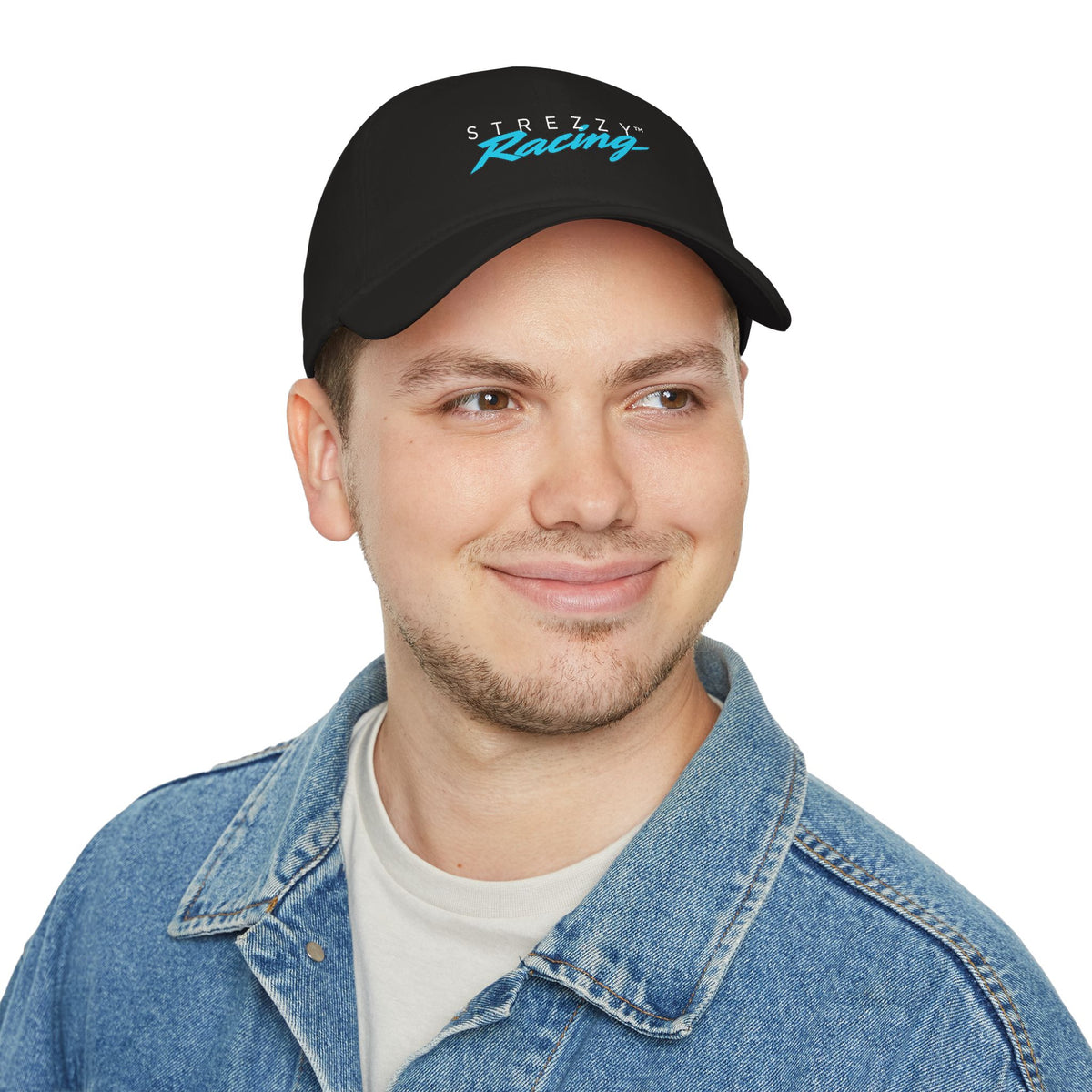 Man wearing a black racing cap with STREZZY Racing logo