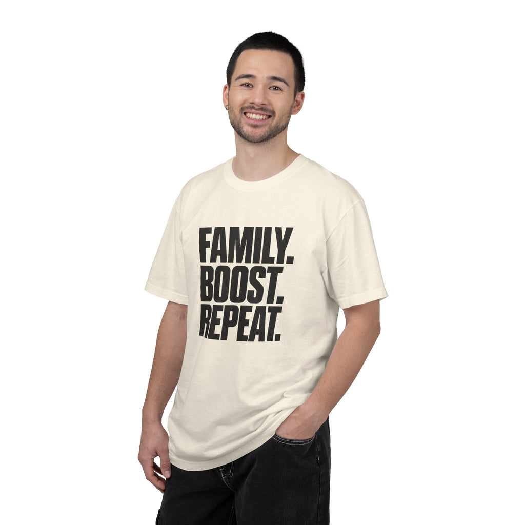 Ivory crew-neck T-shirt with "FAMILY BOOST REPEAT" graphic front on model