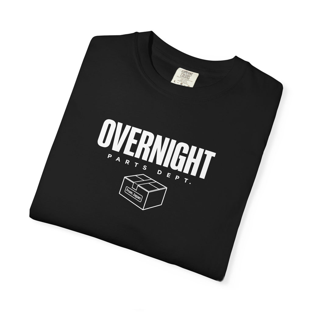 Black T-shirt with OVERNIGHT parts dept. logo graphic across the chest