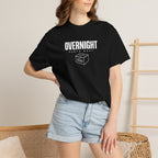 Black crewneck T-shirt worn with light blue denim shorts