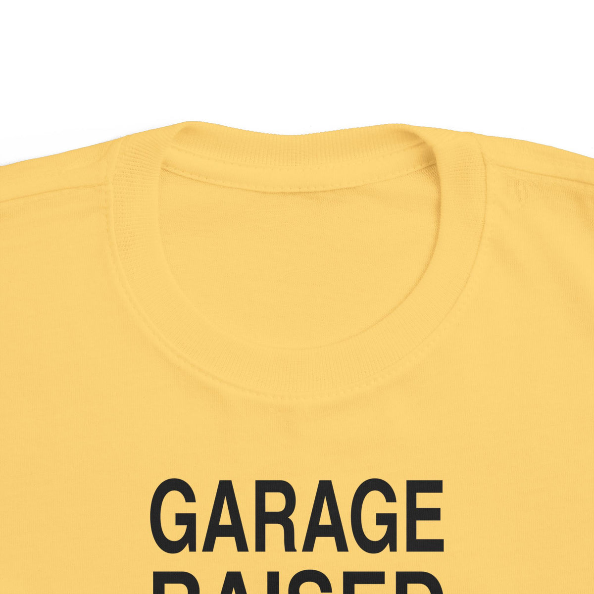 Butter yellow toddler T-shirt with “GARAGE” front print