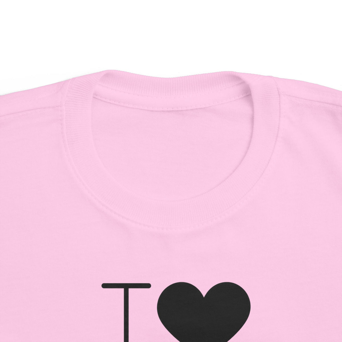 Pink toddler T-shirt close-up of neckline and “I ♥” graphic