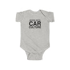 Light gray baby bodysuit with short sleeves and front “Born Into Car Culture” graphic