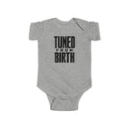 Heather gray baby bodysuit with short sleeves and “TUNED FROM BIRTH” front graphic