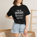 Black crewneck T-shirt worn with “I'M IN DANGER” graphic print