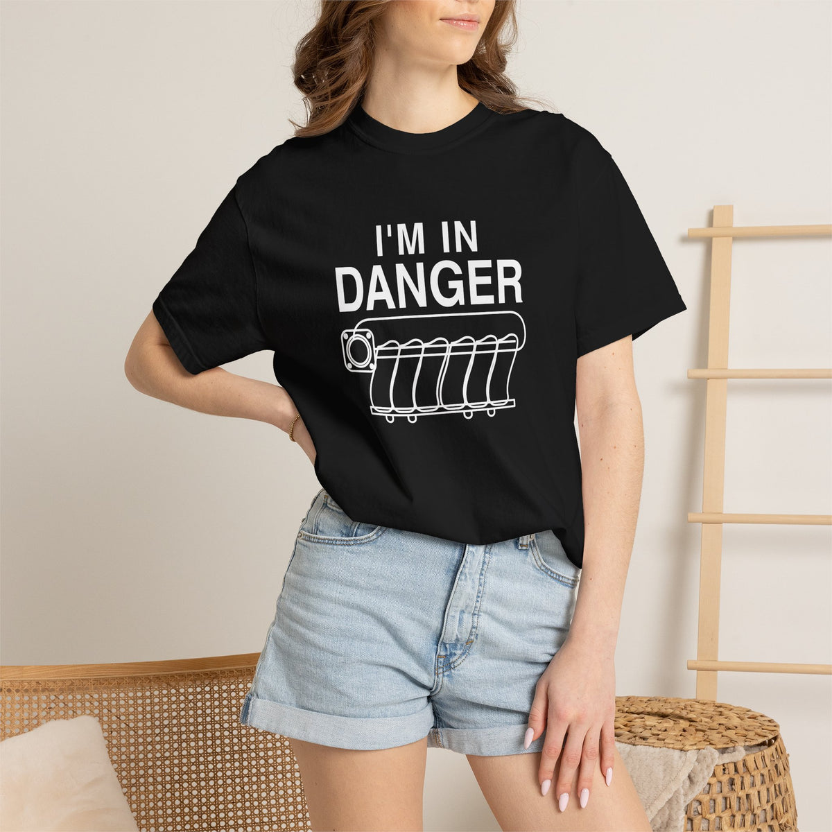 Black crewneck T-shirt worn with “I'M IN DANGER” graphic print