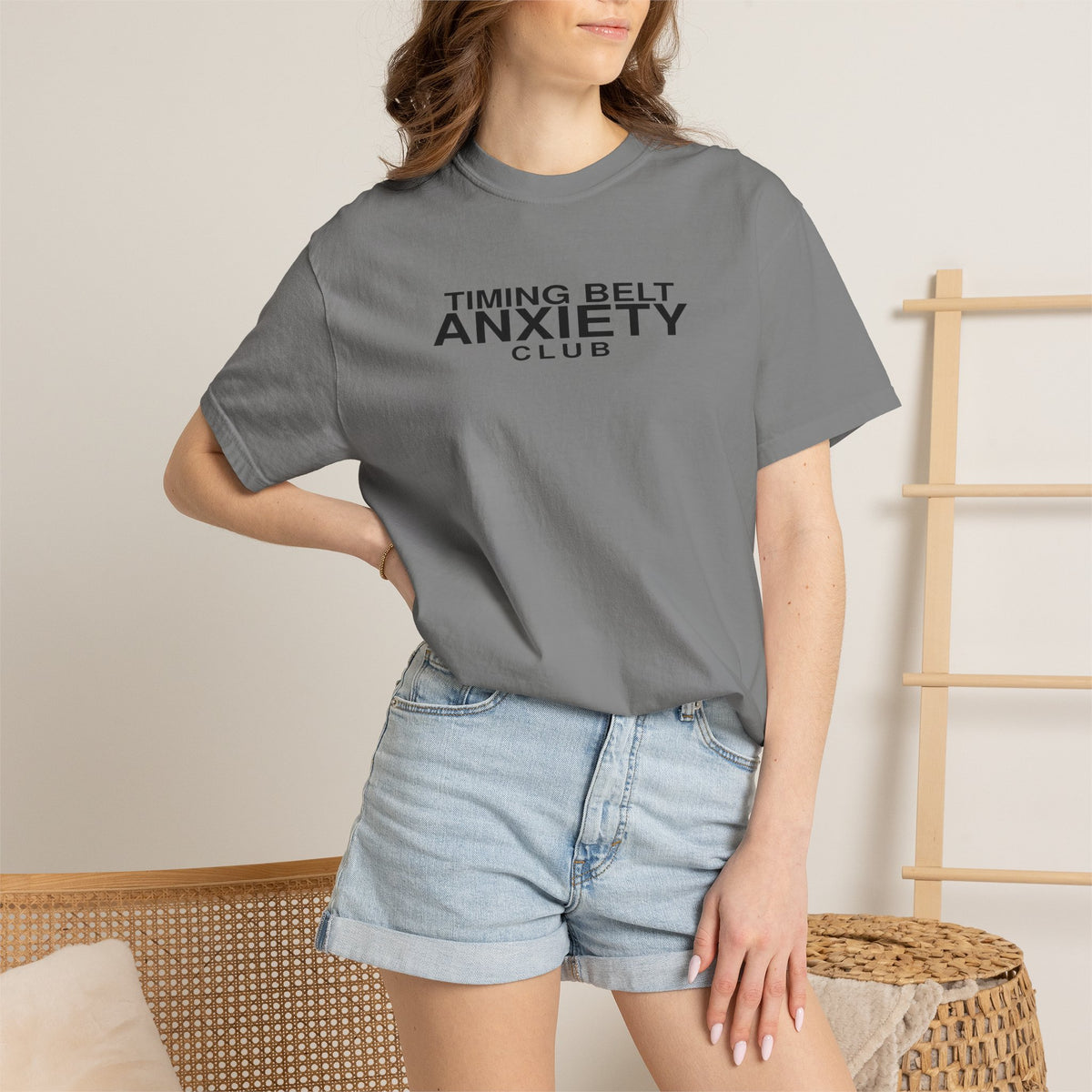 Grey T-shirt with 'Timing Belt Anxiety Club' text, worn by model