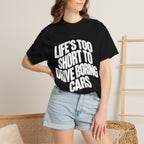Black short-sleeve graphic T-shirt worn by model, front slogan print