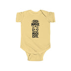 Baby bodysuit in butter yellow with monster graphic and “So much cute” text