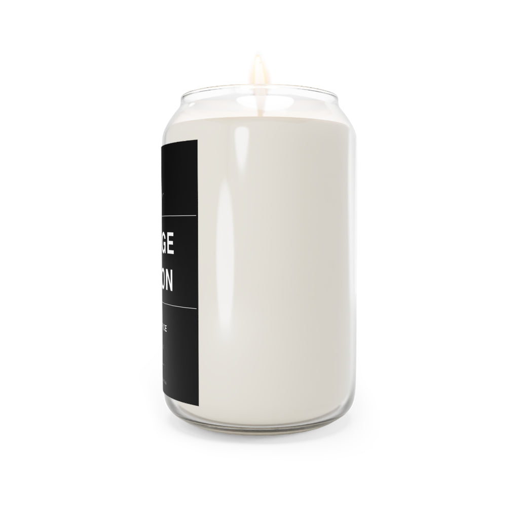 Clear glass jar soy candle with off-white wax and black label panel, with flame