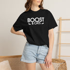 Black crewneck T-shirt with white “BOOST & CATS” graphic, worn by model