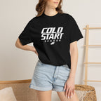 Black T-shirt worn by model with "COLD START SEASON" logo on front